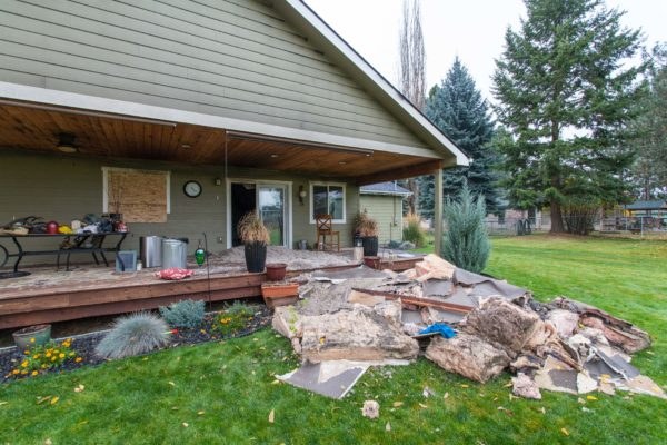 Fire-damaged back deck before restoration