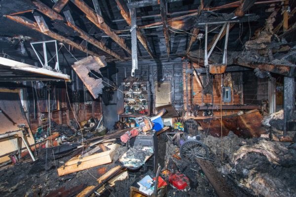 Fire-damaged great room ceiling before restoration